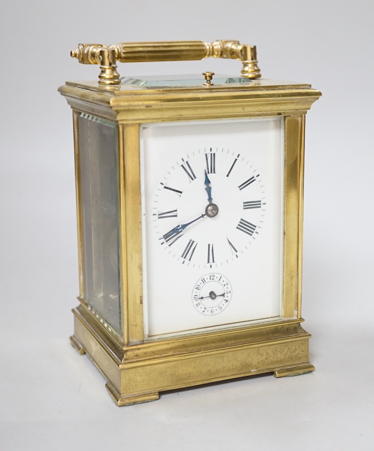 A large French gilt brass repeating carriage clock with alarm and enamel dial, 18cm high
